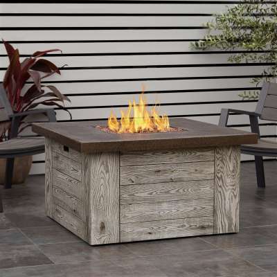 Real Flame Forest Ridge Propane Fire Pit Outdoor Fire Table On An Outdoor Patio.